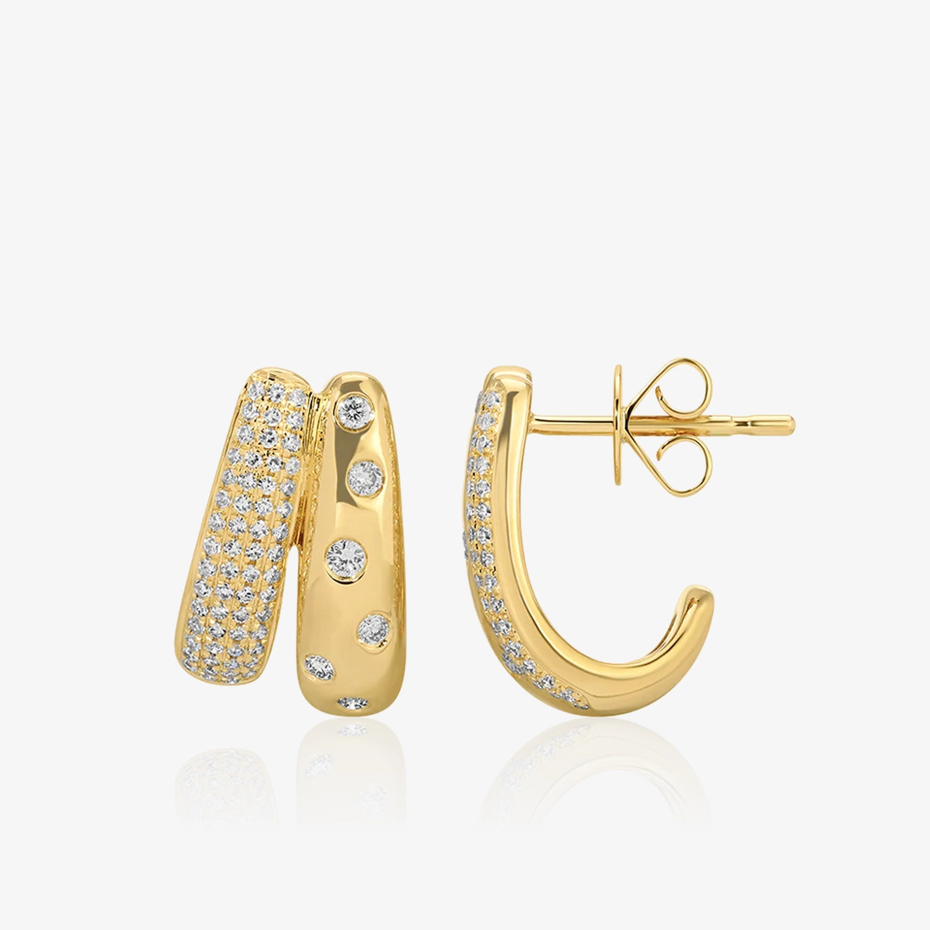 Pendientes gruesos de oro y diamantes