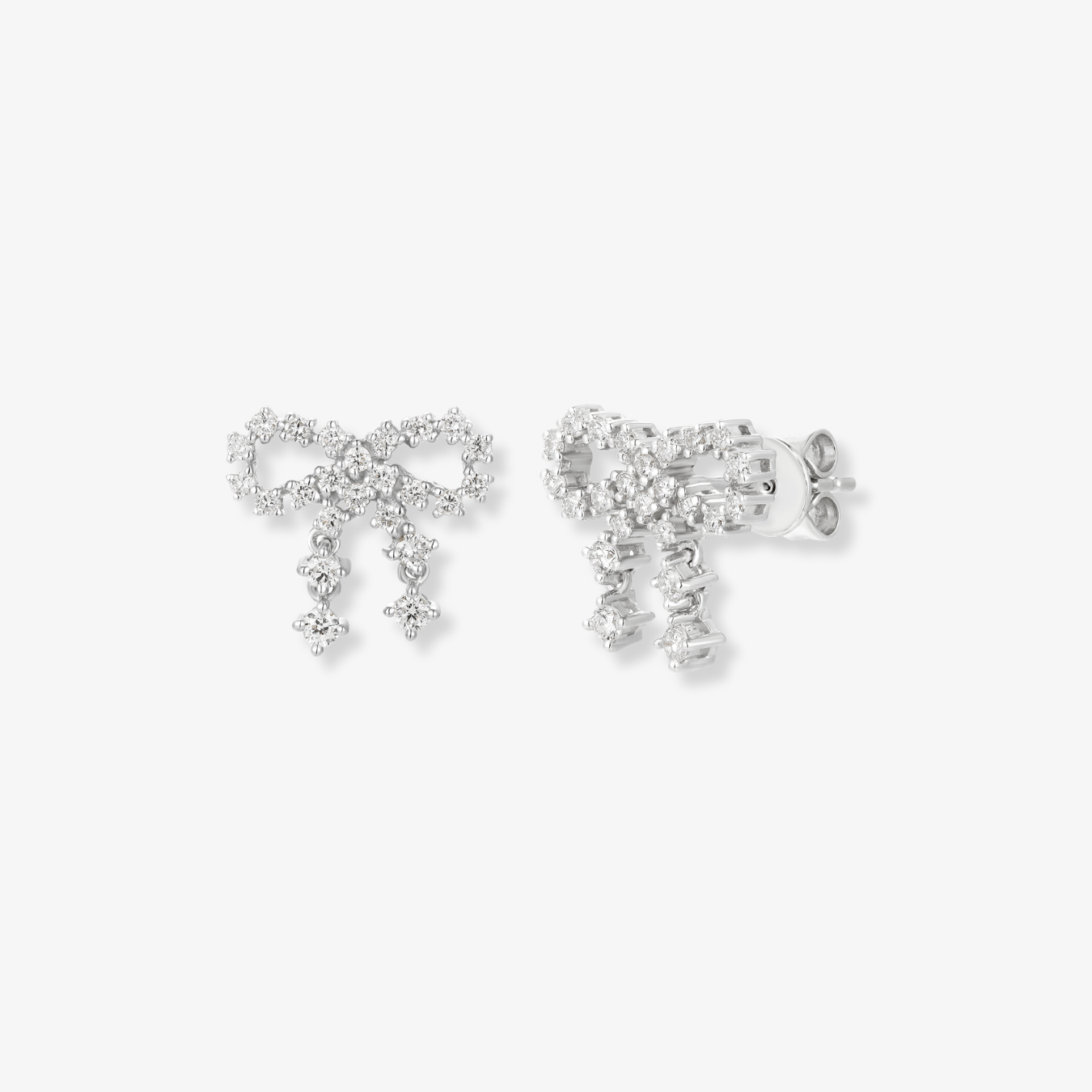 Pendientes de diamantes con lazo dorado