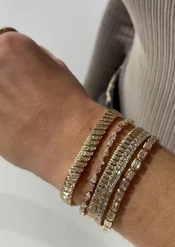 Pulsera trenzada de diamantes y oro